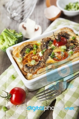 Quiche Lorraine With Chicken, Mushrooms And Broccoli Stock Photo