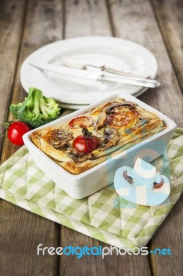 Quiche Lorraine With Chicken, Mushrooms, Broccoli And Tomatoes Stock Photo