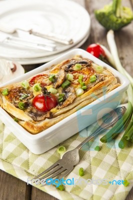 Quiche Lorraine With Chicken, Mushrooms, Broccoli And Tomatoes Stock Photo