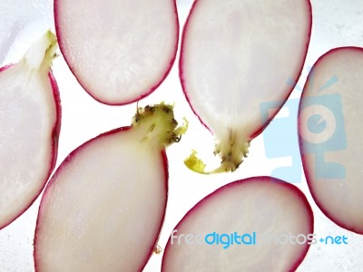 Radish Slices On Ice  Stock Photo