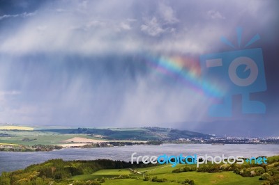 Rainbow After Rain. Spring Rain And Storm In Mountains Stock Photo