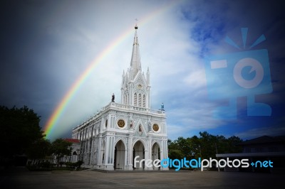 Rainbow Bridge And Church Stock Photo