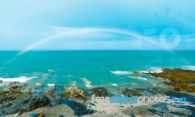 Rainbow Over Sea Stock Photo