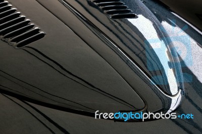 Raindrops On Vintage Car Bonnet Stock Photo