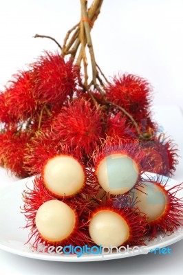 Rambutan Fruit On Plate Stock Photo