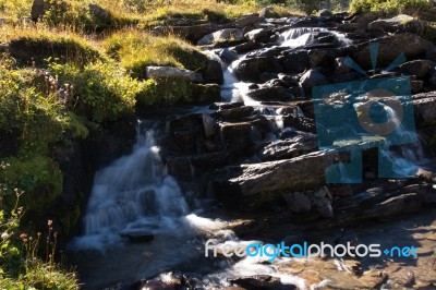 Rapids In Glacier National Park Next To The Going To The Sun Roa… Stock Photo