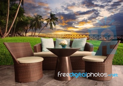 Rattan Chairs In Outdoor Terrace Living Room Against Beautiful S… Stock Photo