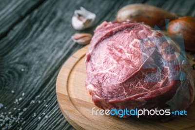 Raw Angus Beef  With Seasoning On The Wooden Table Horizontal Stock Photo