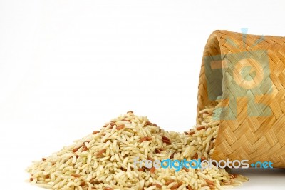 Raw Brown Rice With Bamboo Box; Kratip Stock Photo