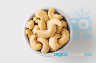 Raw Cashew Nut In White Bowl Stock Photo