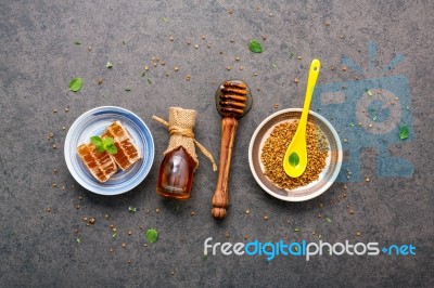 Raw Organic Bee Pollen On Dark Stone Background. Bee Pollen Gran… Stock Photo