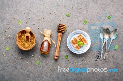 Raw Organic Bee Pollen On Dark Stone Background. Bee Pollen Gran… Stock Photo