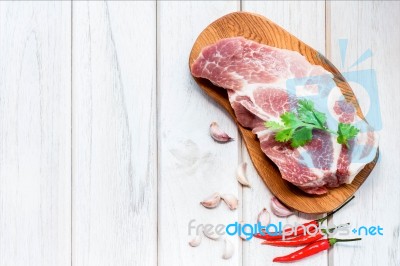 Raw Pork Tenderloin On A Cutting Board Ready To Cook Stock Photo