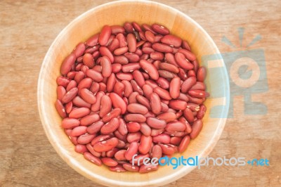 Raw Red Kidney Bean In Wooden Bowl Stock Photo