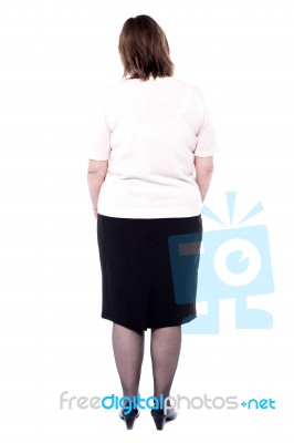 Rear View Of A Senior Woman Stock Photo