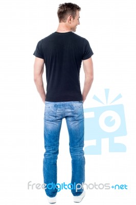 Rear View Of Young Casual Man Stock Photo