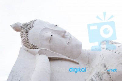 Reclining Big White Buddha Statue At Wat Sa Tue Stock Photo