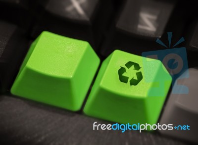 Recycling Computer Key In Green Stock Photo