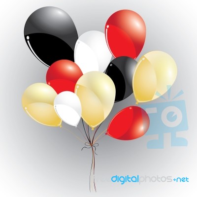 Red And Gold With Black, White On A Balloons. Multicolored Balloons On A Grey Background. Balloons Stock Image