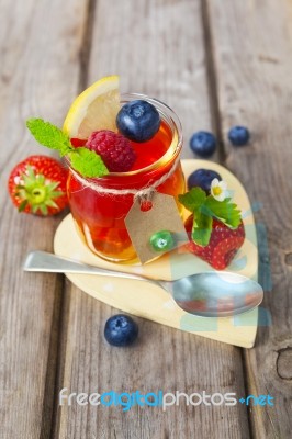 Red And Yellow Jelly Served With Fruit Stock Photo