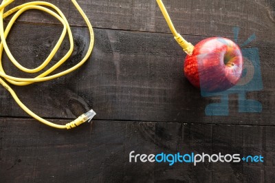 Red Apple Connected To A Data Network Stock Photo