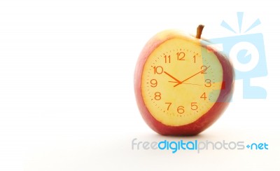 Red Apple Slice Clock Idea Concept Stock Photo