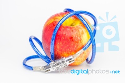 Red Apple With A Key Code Stock Photo