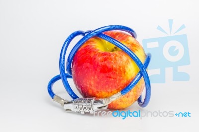 Red Apple With A Key Code Stock Photo