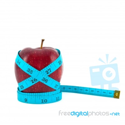 Red Apple With Tape Stock Photo