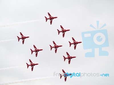 Red Arrows In Flight Stock Photo