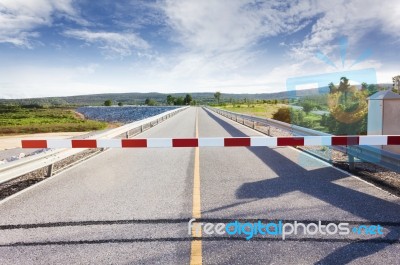 Red Barricade At Stop Area At Long Way End Stock Photo