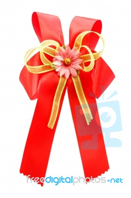 Red Bow And Artificial Flower Stock Photo