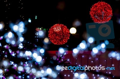 Red Bright Balls With White Foreground Lights Stock Photo