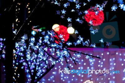 Red Bright Balls With White Foreground Lights Stock Photo