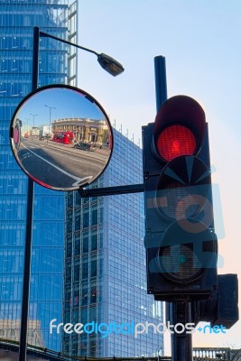 Red Bus And Red Traffic Light In London Stock Photo