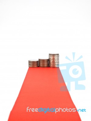 Red Carpet And Coin Stock Photo