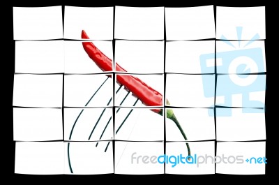 Red Chili Pepper On A Fork Stock Photo