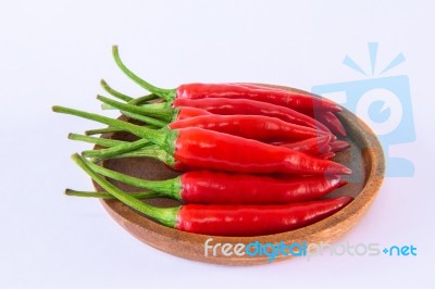 Red Chili Pepper On A White Background Stock Photo