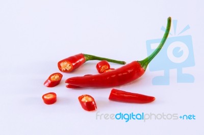 Red Chili Pepper On A White Background Stock Photo