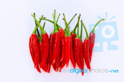 Red Chili Pepper On A White Background Stock Photo