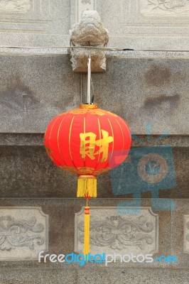 Red Chinese Lamp Behind Church Stock Photo