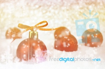 Red Christmas Ball With Bokeh In Merry Metal Tone Stock Photo