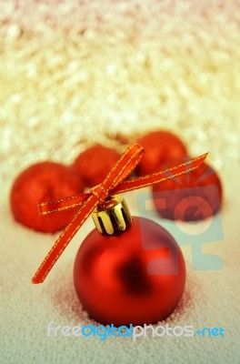 Red Christmas Ball With Bokeh In Merry Metal Tone Stock Photo