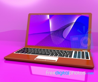 Red Computer On Desk With Spiral Pattern Stock Image