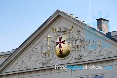 Red Cross On The Facade Of The Charles Bridge Museum In Prague Stock Photo