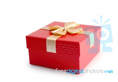 Red Gift Box And Gold Ribbon Isolated Stock Photo