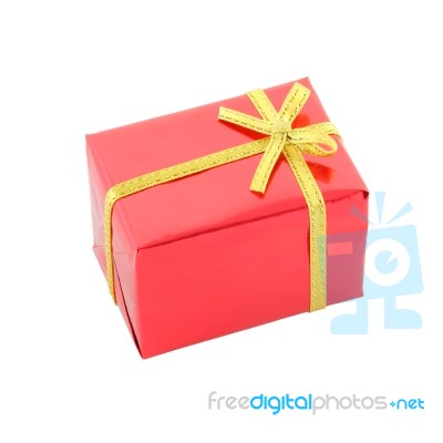 Red Gift Box And Golden Ribbon On White Background Stock Photo