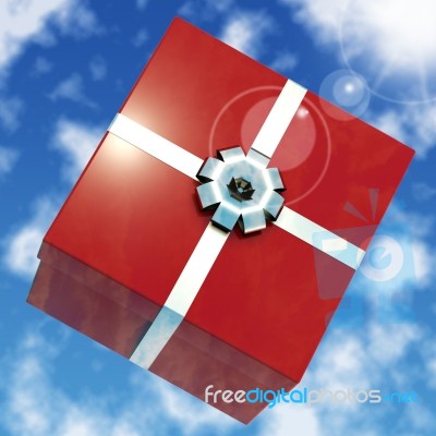 Red Giftbox With Sky Background Stock Image