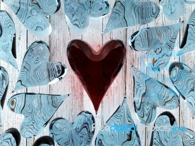 Red Glass Heart Among Blue Glass Hearts Stock Image