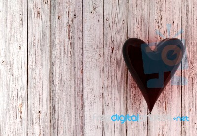 Red Glass Heart On White Wood Background Stock Image